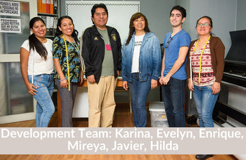 Six people stand side by side in a room with office equipment. A text label at the bottom identifies them as the development team: Karina, Evelyn, Enrique, Mireya, Javier, Hilda.